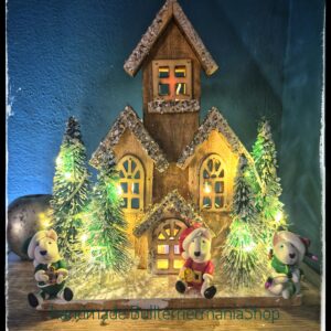 Handmade Bull Terrier Christmas village with integrated LED lights.
