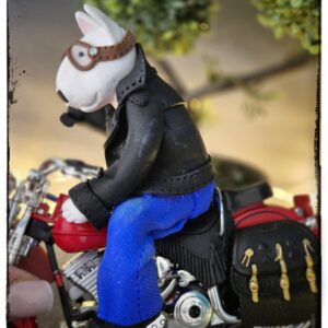 Handmade Biker Bull Terrier Sculpture riding a classic red motorcycle