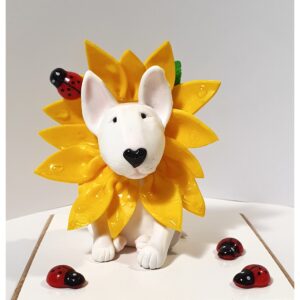 Handmade Bull Terrier sunflower figurine with bright yellow petals.