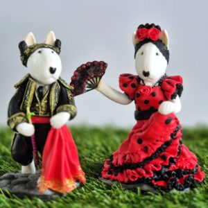 Spanish Bull Terrier couple handmade figurines featuring a matador and flamenco dancer.